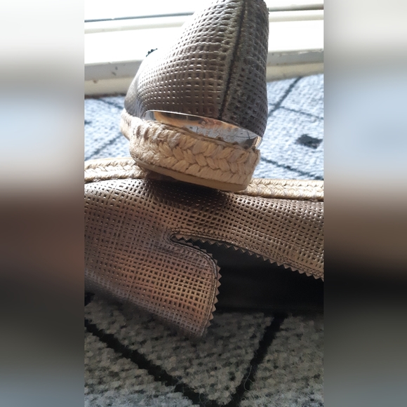 Stuart Weitzman shoes with hardware at rear with a metallic look. - Picture 2 of 4